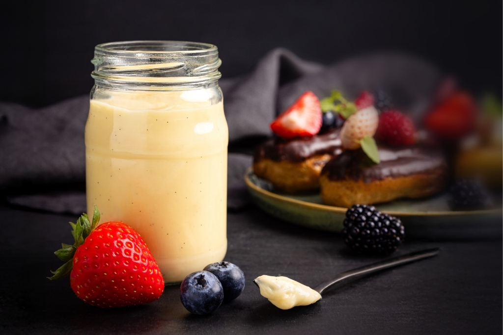 Homemade eclairs with berries
